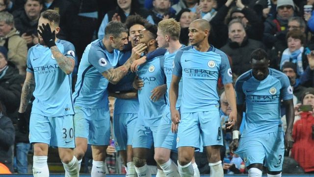 Back on track: Manchester City disposed of Arsenal in a crucial win to their title chances.