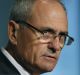 NAB chairman Ken Henry says the bank is closing the gap on rivals after a disappointing share price performance in ...