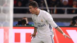 Hat trick hero: Ronaldo celebrates his third goal of the night.