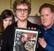 Michael, Kerry and Belinda Cooke who lost their son and twin sibling Ryan in a motorcycle crash earlier this year.