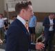 SYDNEY, AUSTRALIA - DECEMBER 10: Auctioneer Lachlan McDonald selling 5/52 Edward Street, Bondi which sold for $1,070,000 ...