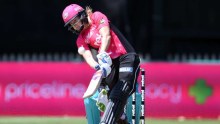 Ellyse Perry plays a drive for the Sixers