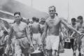 Liberated POWs at Changi carrying a bucket of rice from the mess. The inquiry is investigating recognition for prisoners ...