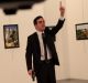 A man with a gun shouts inside the Ankara gallery as Russian ambassador to Turkey Andrei Karlov lies on the ground.