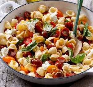 Orrechiette with cherry tomatoes, basil and pine nuts.