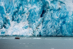 A Zodiac in front of the Dawes Glacier, Endicott Arm.