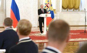 Russian Federation's president Vladimir Putin speaks at the official dinner for the paralympians, who participated at the substitute competition, as they were not allowed to compete in Rio 2016 Paralympics