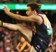 Sam Lloyd of the Tigers kicks the match-winning goal after the siren.