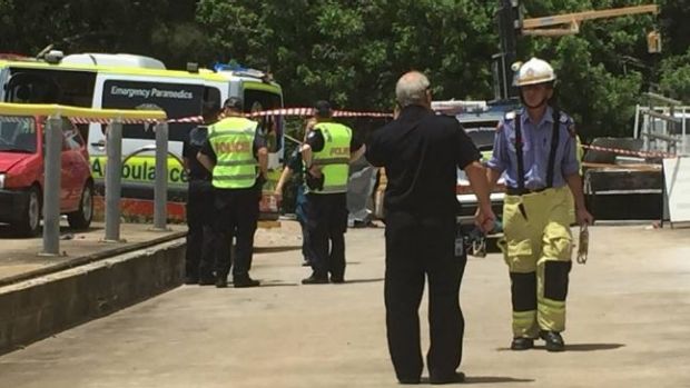 Emergency workers at the scene of a workplace accident at Cleveland.