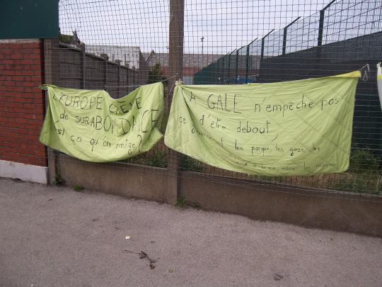 Banners on the fence of the food distribution center