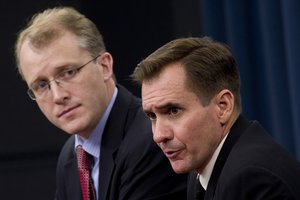 George Little and Capt. John Kirby brief the Pentagon press corps.