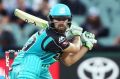 Brisbane's Alex Ross reverse sweeps against his former team the Adelaide Strikers.