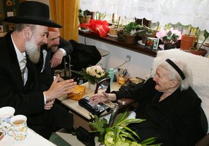 Chief Ashkenazi Rabbi of Israel Yona Metzger, left and Chief Rabbi of Poland Michael Schudrich speak with Holocaust hero Irena Sendler, 98, right, during a meeting in Warsaw, Poland, Thursday, Feb. 21, 2008.