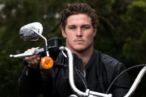 Wallabys player, Michael Hooper, in Sydney, with his new Harley that he plans to ride a lot during the season break over ...