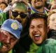 Joseph Tapine of the Raiders celebrates with fans after victory in the second NRL Semi Final match between the Canberra ...