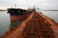 Exports of iron ore could be slowed this week if a weather system develops into a cyclone.
