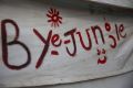 A painted message on a tent in the Jungle migrant camp in Calais.