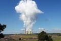 Steam rises from the Loy Yang coal power station in Victoria.