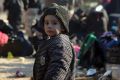 A young Syrian child evacuated from Aleppo arrives at a refugee camp in Rashidin, near Idlib, Syria.