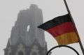 The German Flag waves at half-mast in Breitscheidtplatz where a truck ploughed through a Christmas market on December 20.