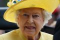 Queen Elizabeth II arrives by carriage on the first day of the Royal Ascot horse race meeting at Ascot, in June.