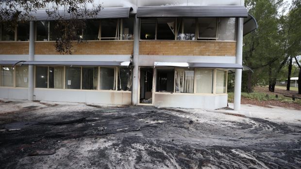 Clean up: The front of the Australian Christian Lobby office in Canberra on Tuesday morning.