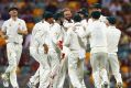 Nathan Lyon of Australia celebrates after taking the wicket of Babar Azam on day three.