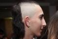 Sydney teen Ali Ziggi Mosslmani sues media outlets over mullet photo.