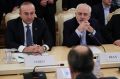 Turkish Foreign Minister Mevlut Cavusoglu, left, and Iranian Foreign Minister Mohammad Javad Zarif listen to Russian ...