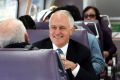 Prime Minister Malcolm Turnbull on a train in Sydney's west.