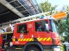 Workers evacuated from burning factory