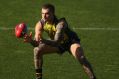 On the attack: Dustin Martin will be aiming to kick more goals next season.