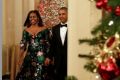 President Barack Obama and First Lady Michelle Obama  brought the festive with a capital F to the Kennedy Center Honors ...