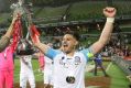 Tim Cahill and Bruno Fornaroli celebrate the FFA Cup win in November.