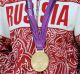FILE - In this Aug. 10, 2012 file photo a gold medalist from Russia participates in a medals ceremony at the 2012 Summer ...