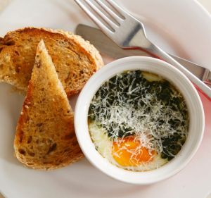 Breakfast doesn't have to be a blowout like the rest of the day - start your Christmas with something easy, like baked eggs.