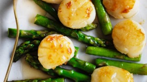 Adam Liaw's scallops and asparagus in silver sauce.