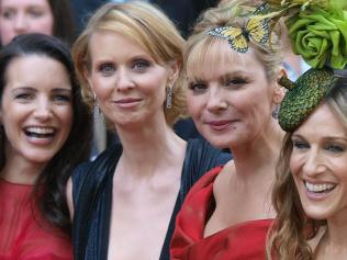 13/05/2008 WIRE: (From L to R) US actresses Kristin Davis, Cynthia Nixon, Kim Catrall, and Sarah Jessica Parker pose for the photographers after arriving in London's Leicester Square on May 12, 2008, to attend the World Premiere of their latest film, Sex and the City. The film is an adaptation for the big screen of the TV series. AFP PHOTO/Max Nash