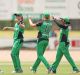 ALBURY, AUSTRALIA - DECEMBER 13: Meg Lanning of the Stars is congratulated by her teammates after taking a spectacular ...