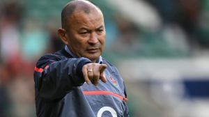 LONDON, ENGLAND - DECEMBER 03: Eddie Jones the England head coach watches over his team's warm up prior to kickoff ...