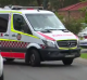 Ambulance leaving the street in Glenwood.