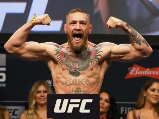 (FILES) This file photo taken on November 10, 2016 shows UFC Featherweight Champion Conor McGregor during UFC 205 Weigh-ins at Madison Square Garden in New York. Mixed martial arts superstar Conor McGregor has been issued a boxing license in the state of California, US media reported December 30, 2016 in a development sure to revive talk of a McGregor-Floyd Mayweather meeting in the ring. ESPN and MMAjunkie.com reported that the California State Athletic Commission had confirmed a license was issued to McGregor. / AFP PHOTO / GETTY IMAGES NORTH AMERICA / Michael Reaves