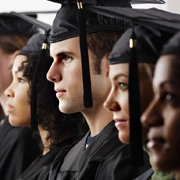 Row of students wearing graduation outfits