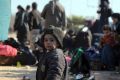 A young Syrian child evacuated from Aleppo arrives at a refugee camp in Rashidin, near Idlib, Syria.