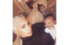 Kim Kardashian posted a photo of herself with daughter North and son Saint on August 13. "Here's a pic from my new ...