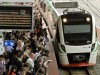 Transperth passengers wait to transfer to a train at the Stirling station. Picture by Mogens Johansen, The West Australian.