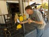 The brother of Lance Williams looks at flowers outside the Claremont Hotel on Friday. Picture: Trevor Collens