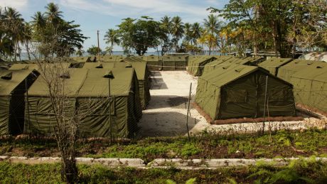 A refugee has been airlifted from Manus Island to Brisbane with head injuries, according to refugee advocates.