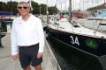 Smiling: Shane Kearns, with his yacht Komatsu Azzuro, is feeling confident about this year's Sydney to Hobart.