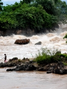 A fisher setting up his gear near the Don Sahong Dam site